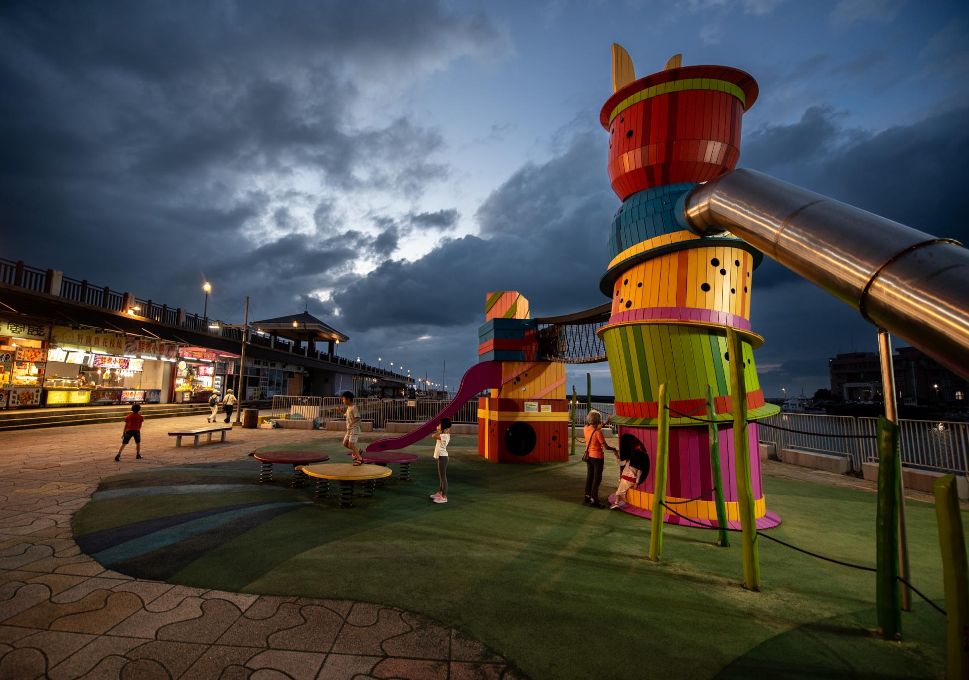 Night shot of colourful playground